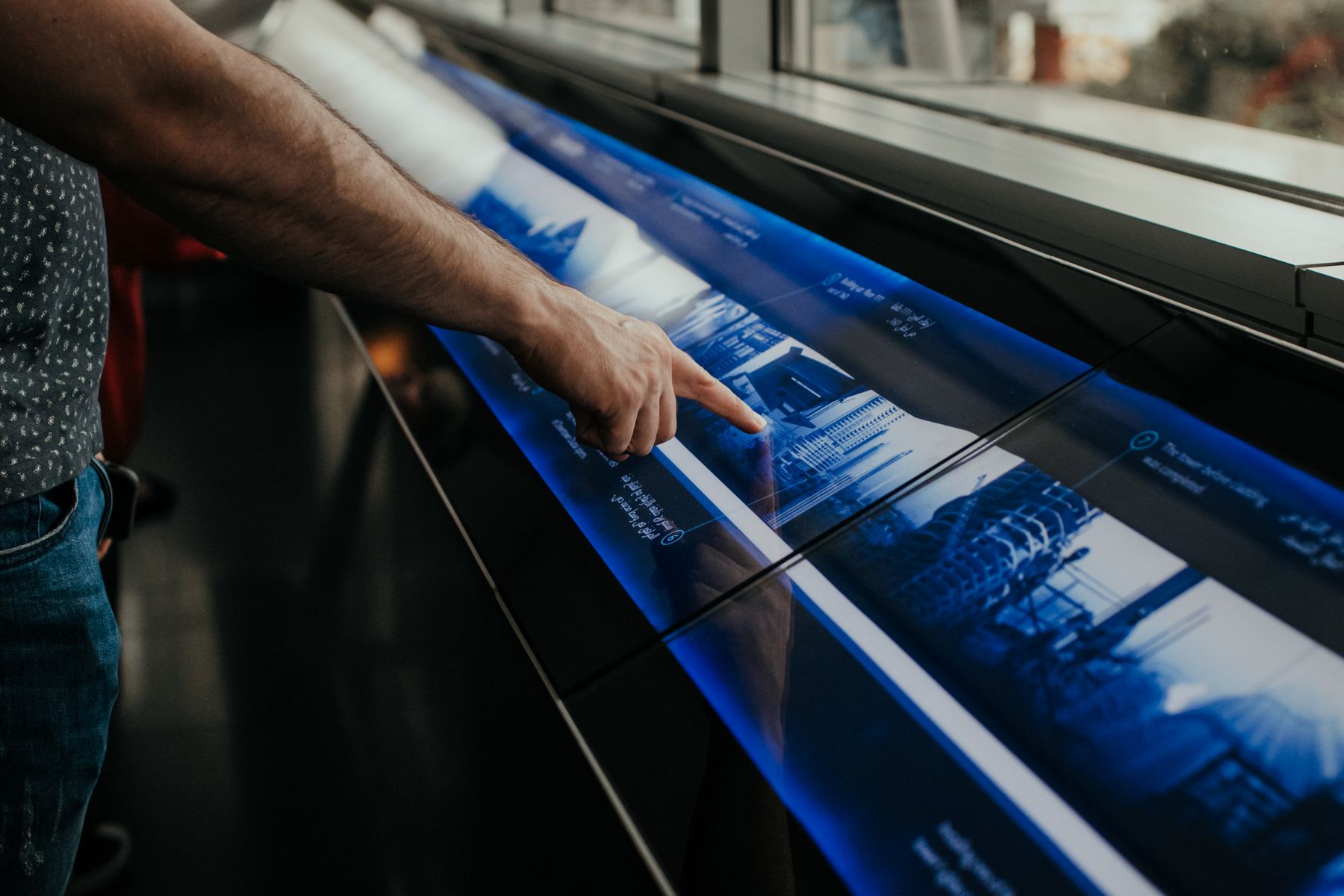 Facilities operator using a building-management touchscreen